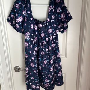 Short dress with sleeves, attractive and fun pattern and color.